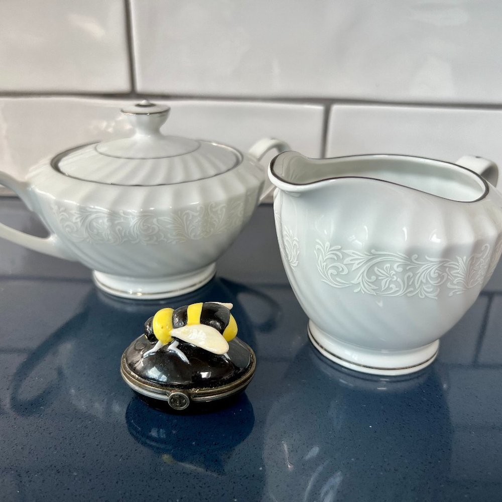 PRICE IS FIRM.  Beautiful M Fine China Creamer and Sugar Bowl Set